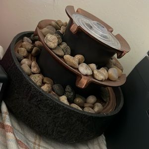 Euc rock and copper colored foundtain zen